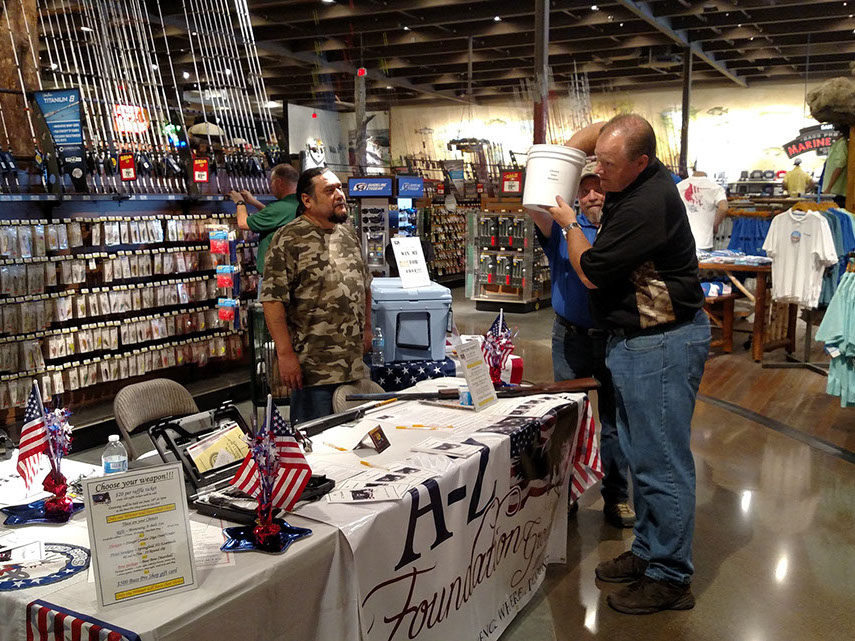 South Bay chairman Manny Machado and committee member Ben Santos Running booth on August 26-28 at the San Jose Bass Pro Shop store and Manager D